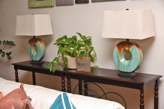 Family Room - Console with Teal Lamps and Indoor Plant