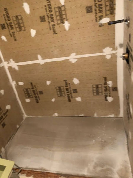 Shower wall prep and floor leveling - Behind the scenes of a practical bathroom remodel - Somers CT Interior Decorating - Details Interiors